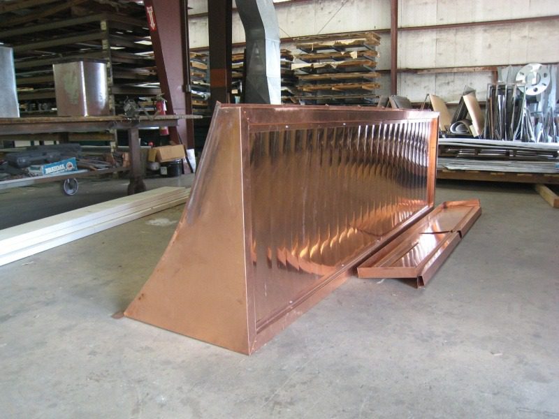 A bench that is made of copper.