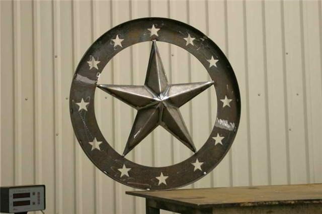 A metal star with white stars on it.