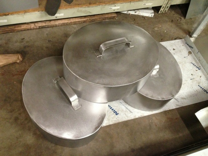 A metal pan sitting on top of a table.
